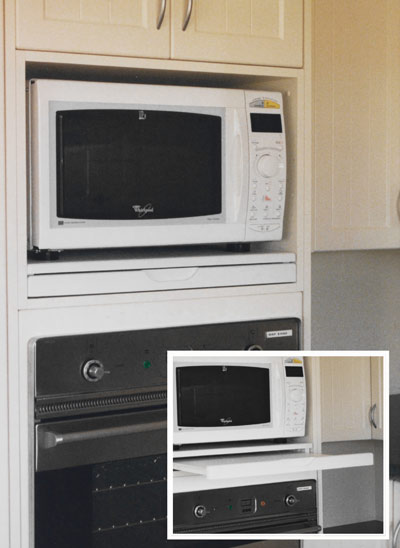 The microwave stealth shelf, a microwave shelf with pull out shelf installed in an oven tower