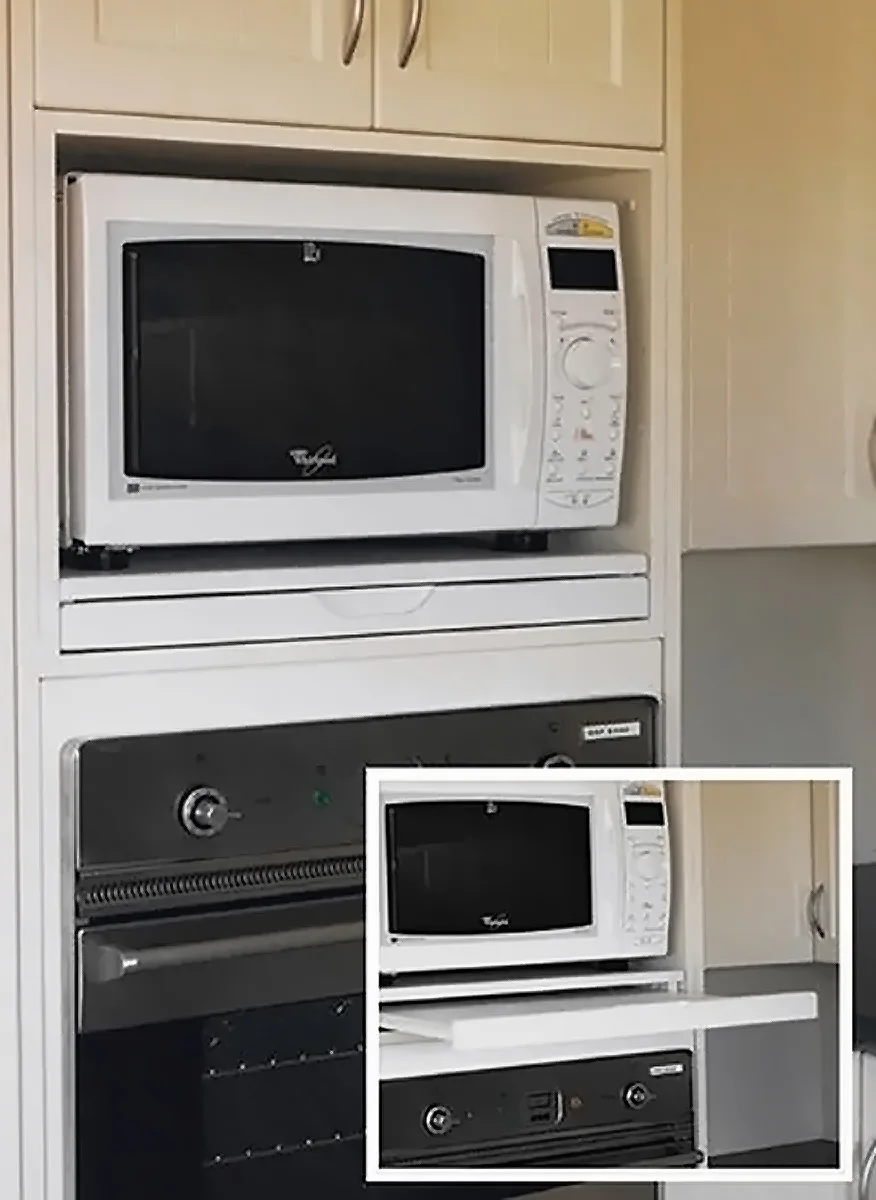 The microwave stealth shelf, a microwave shelf with pull out shelf installed in an oven tower