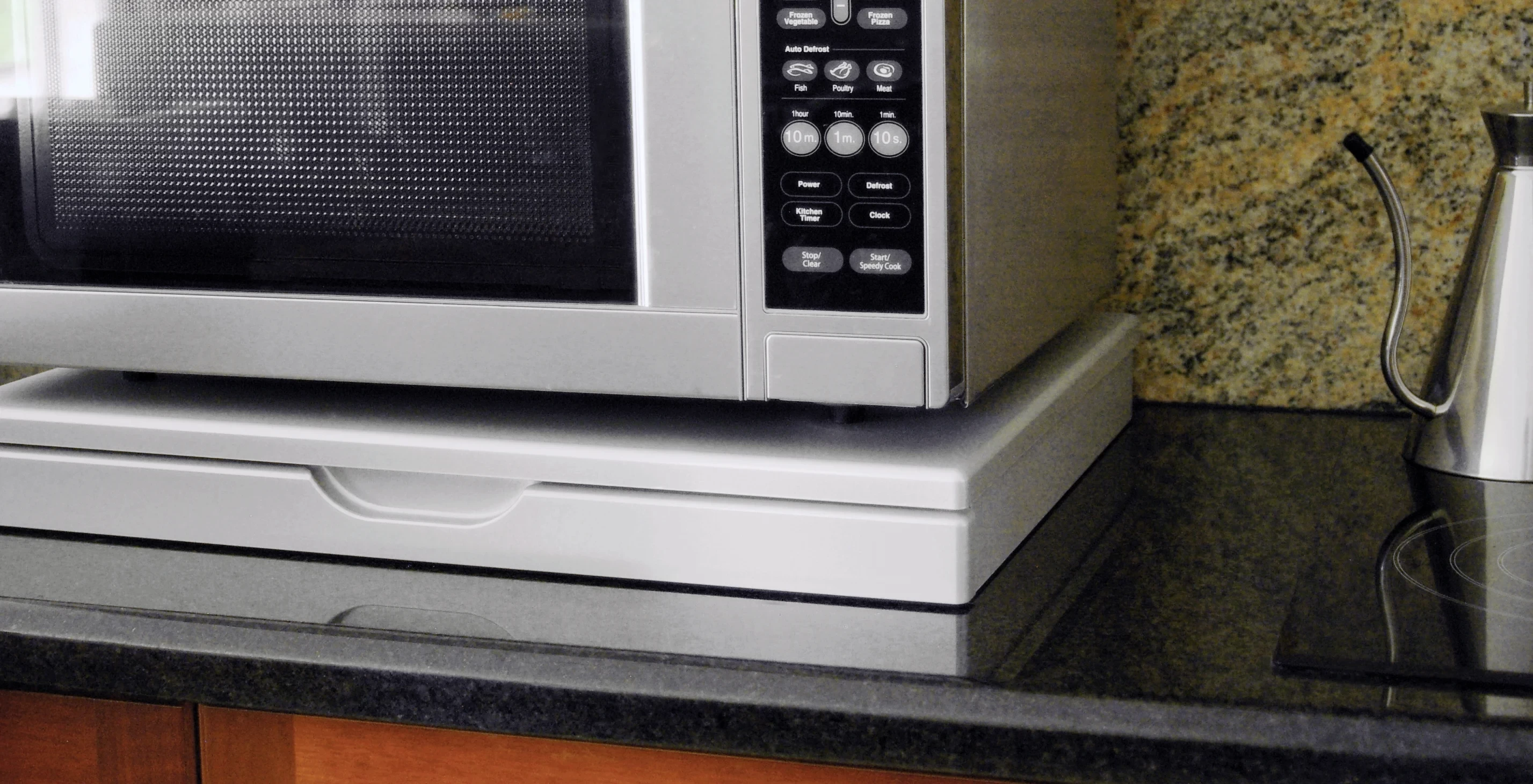 Our microwave shelf, the 560mm wide stainless steel look microwave stealth shelf